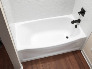 Close up of white contour bathtub hero shot w white 12x12 sim tile walls ORB fixtures
